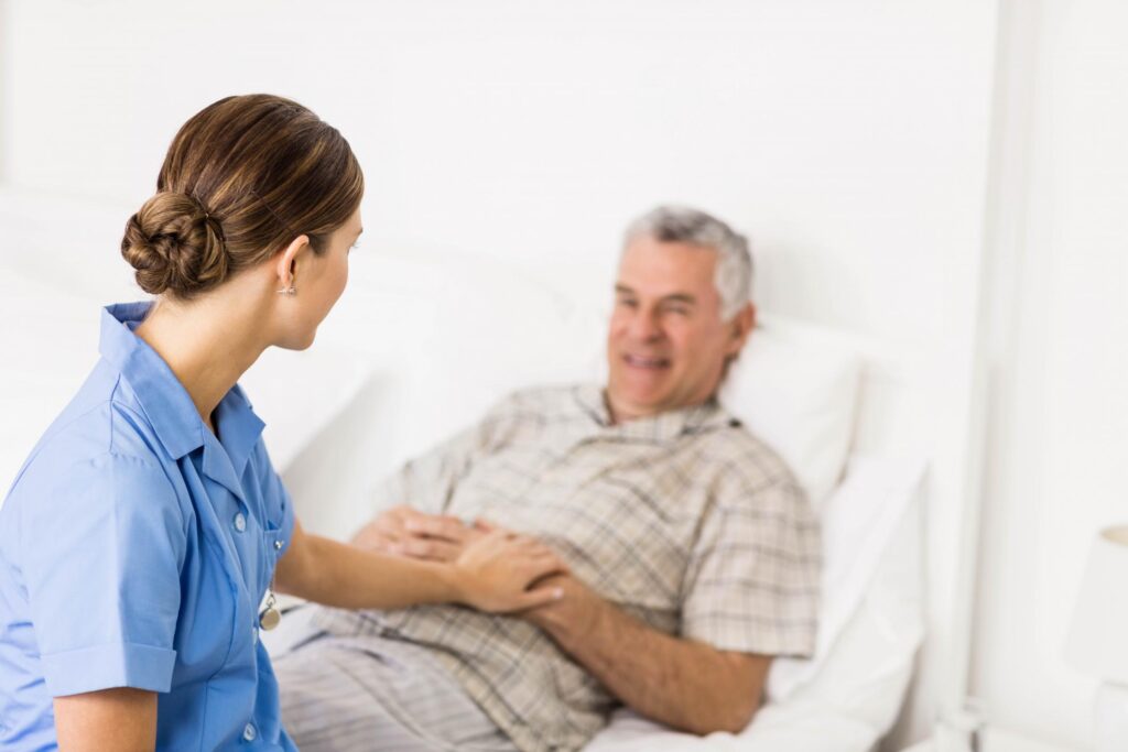 woman holding the patients arm